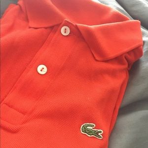 Boys Lacoste bright orange polo